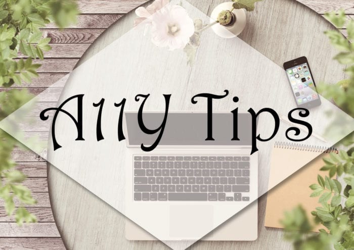 Bistro table with laptop, cell phone, notepad, pen and flower with the words "A11Y Tips"