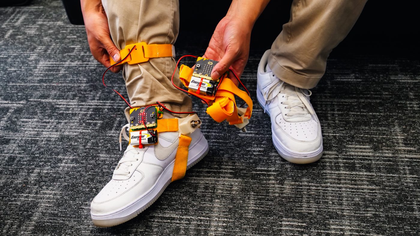 Tap-Tap device strapped on to someone's shin and foot