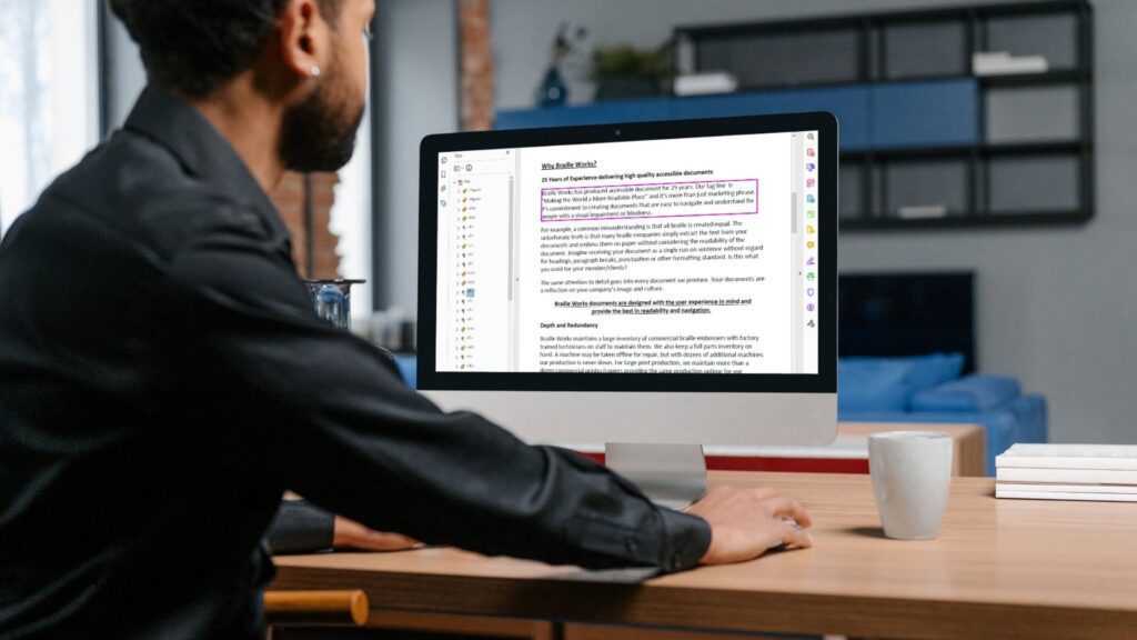 An accessibility expert in their office remediating a PDF